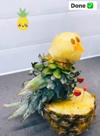 A chopped pineapple was used to create this inventive parrot