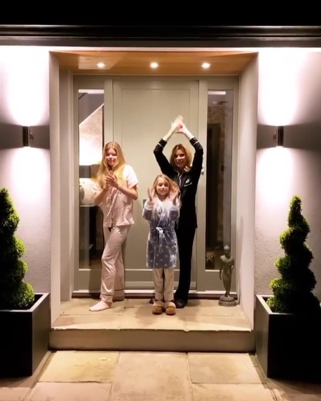  Amanda Holden and her daughters stood outside their front door to applaud our NHS heroes last Thursday