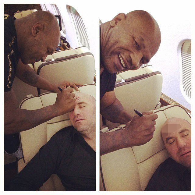  Heavyweight legend Tyson writes 'D***' on White's forehead