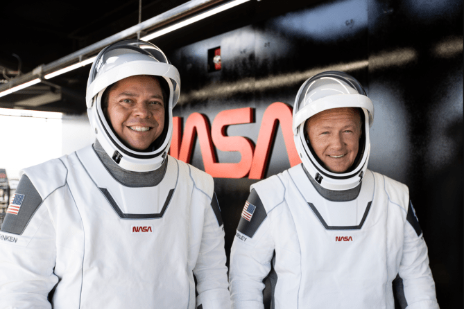 Nasa astronauts Robert Behnken (left) and Douglas Hurley ahead of flight simulations