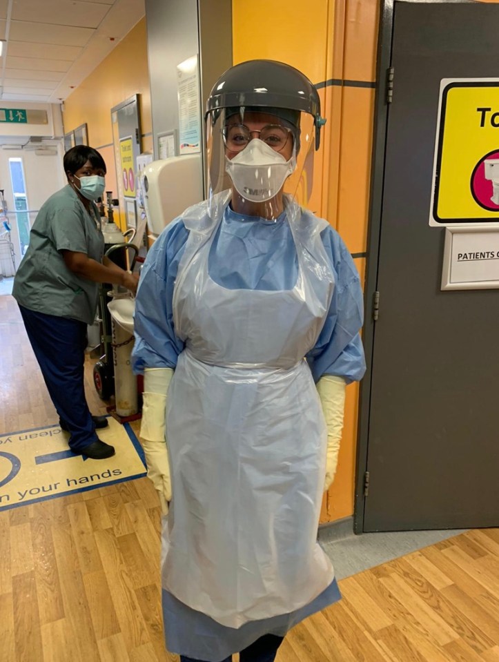  Hannah at work as a nurse in A&E kitted out in PPE that has given her 'lot of breakouts'