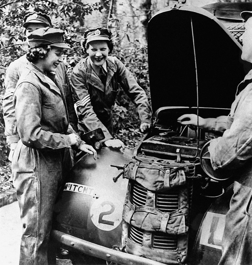  Queen Elizabeth II, then Princess Elizabeth, learning vehicle maintenance on an Austin 10 Light Utility Vehicle while serving with No 1 MTTC at Camberley, Surrey