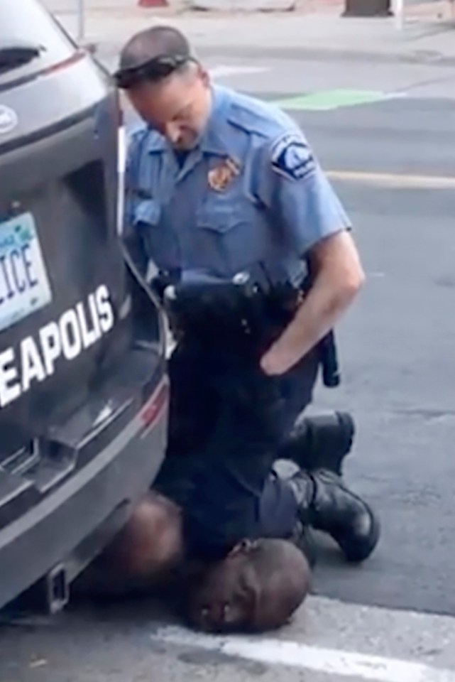 A Minneapolis officer kneels on the neck of George Floyd