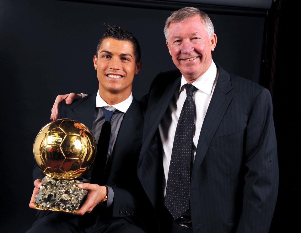 Ronaldo receives the 2008 Ballon Dor from Ferguson