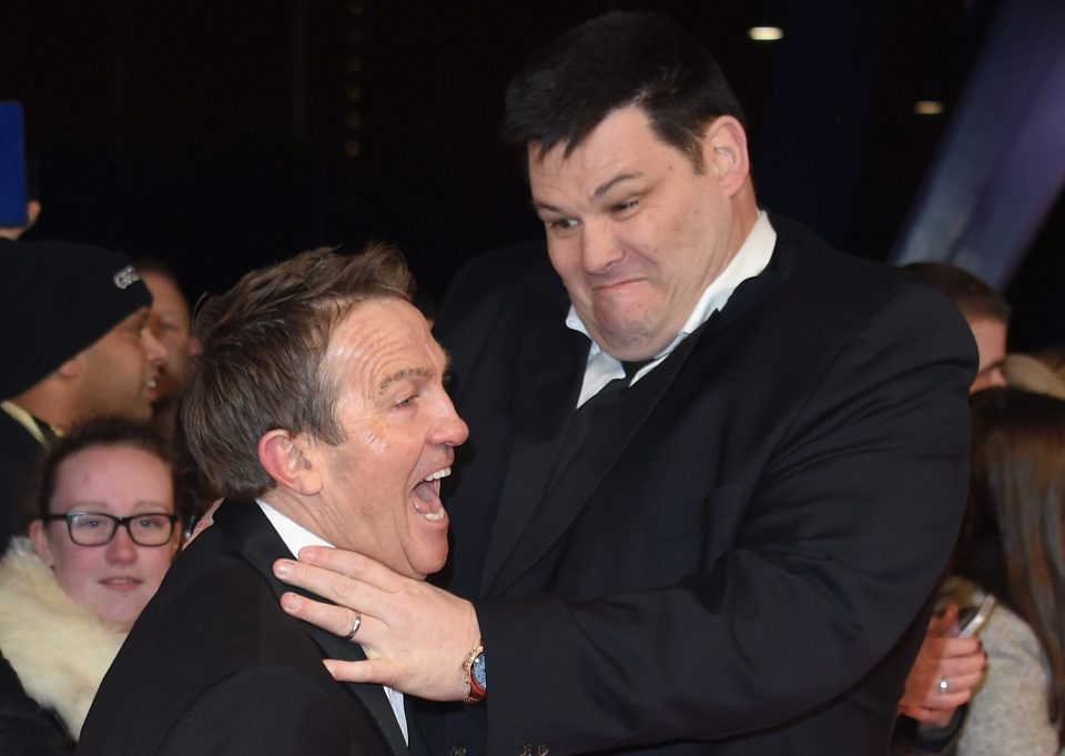  The Beast aka Mark Labbett pretends to strangle cheeky Bradley Walsh