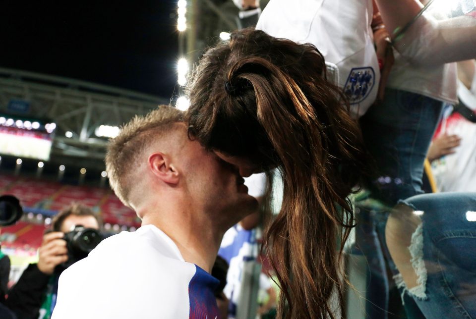  Becky kisses her husband from the stand during an England match against Colombia