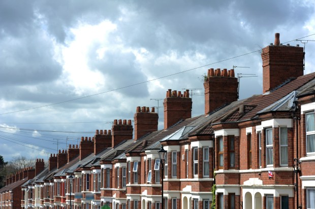 Row of brick terraced houses.