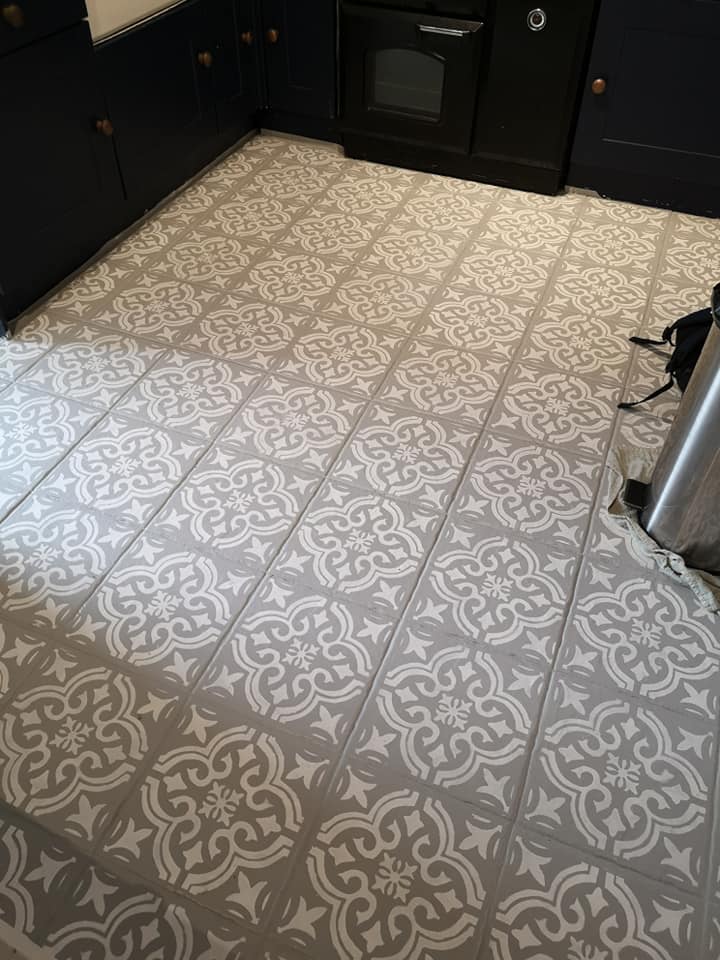 Rachel Spear used a simple stencil from Etsy to create an amazing effect on her kitchen floor