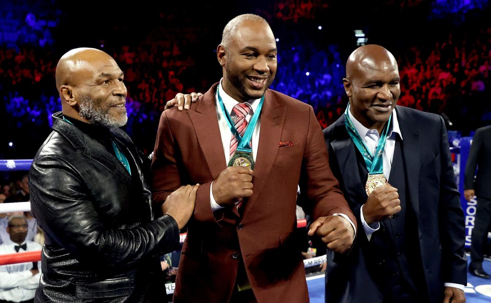 Mike Tyson and Evander Holyfield flank fellow legend Lennox Lewis - who is the odd man out as he is not returning to the ring