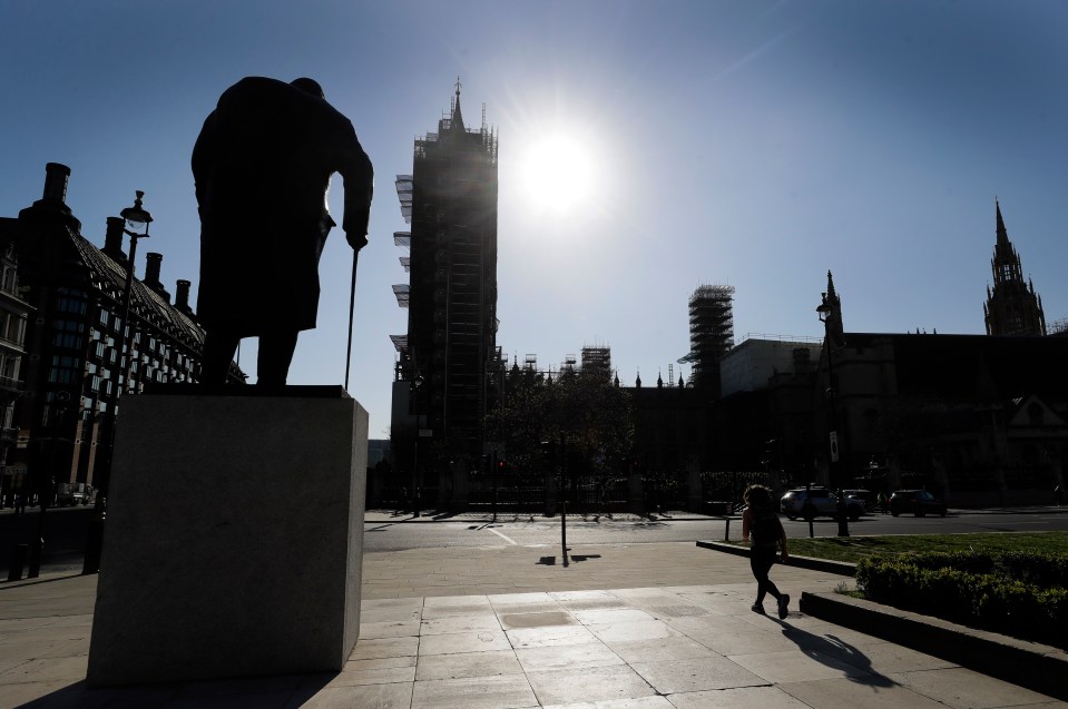  A statue of Winston Churchill stands in front of London's Houses of Parliament