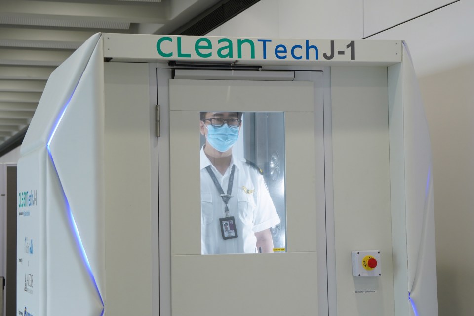  A full body disinfectant cabinet for workers at Hong Kong International Airport on April 24