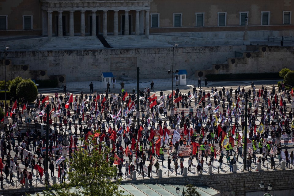  Members of the Greek Labour Union (PAME), respecting the social distances against the spread of the novel coronavirus, COVID-19, protest in front on the Greek Parliament