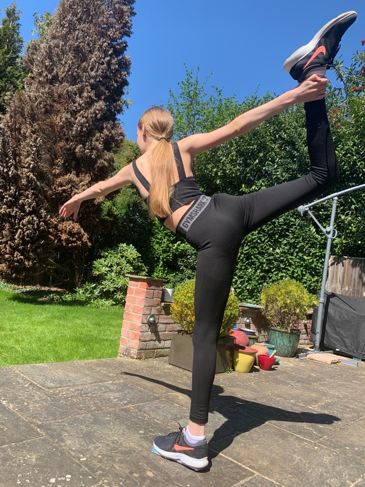  Anna, 14, practices her ice-skating moves on concrete