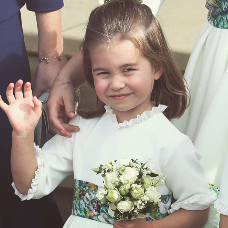 The monarch also included a photo of the little girl as a flower girl at Princess Eugenie's wedding