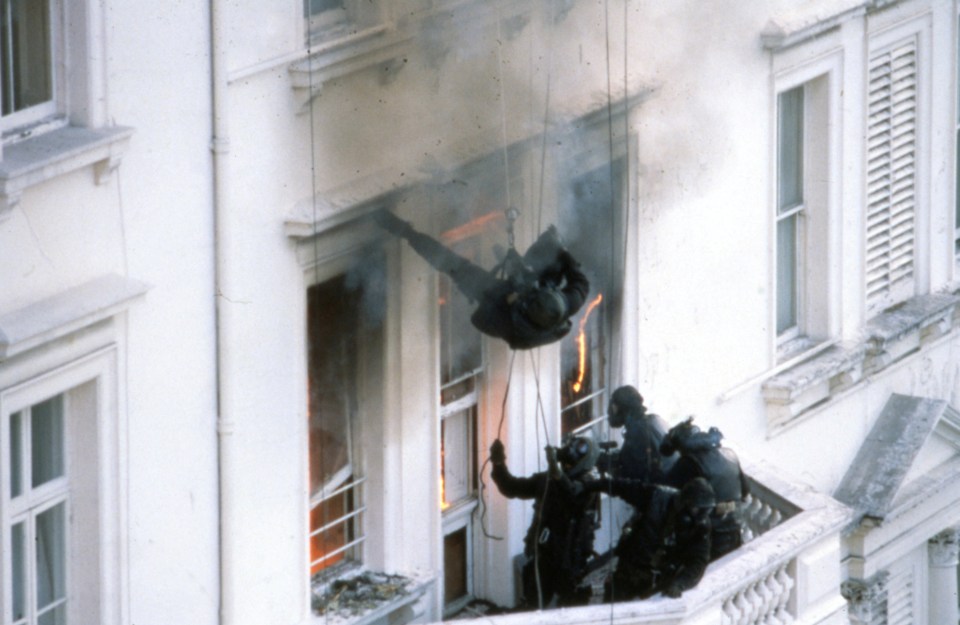 SAS soldiers abseil from the roof of the Iranian embassy building during a siege in 1980