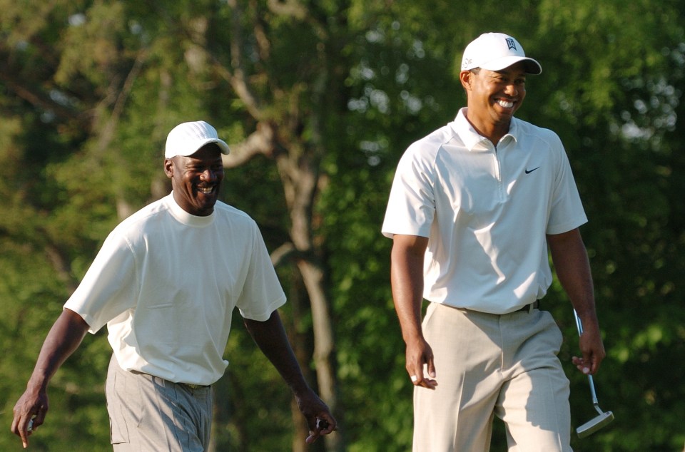  Pals Michael Jordan and Tiger Woods playing golf after a friendship blossomed from when the basketball legend gave tips on attracting the opposite sex