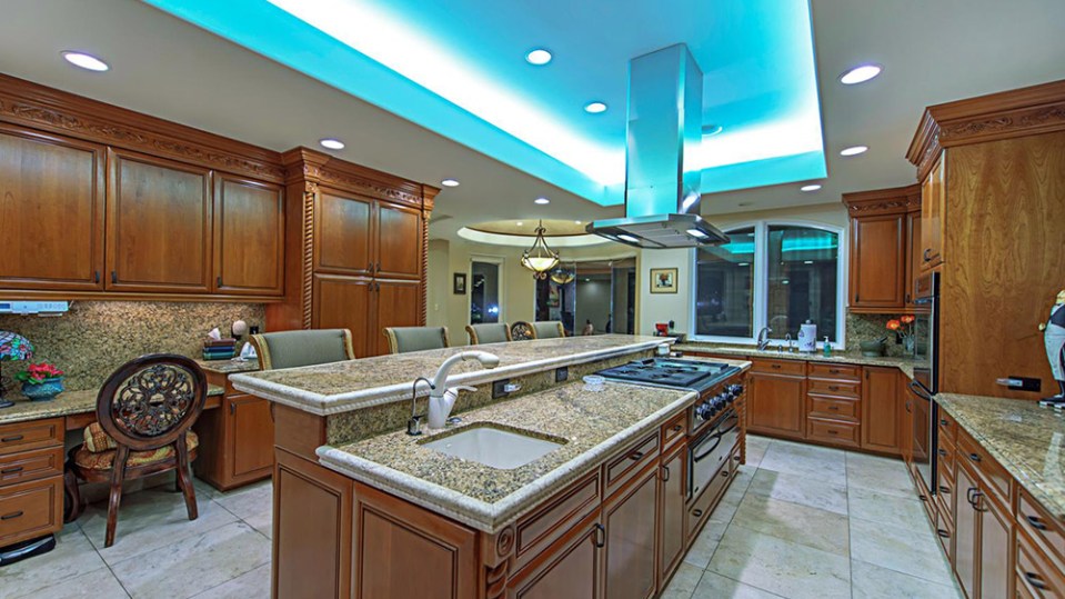 The kitchen boasts modern amenities