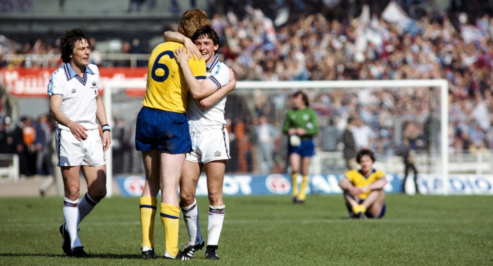  Arsenal defender Willie Young congratulates West Ham United player Paul Allen as Stuart Pearson (left) looks on