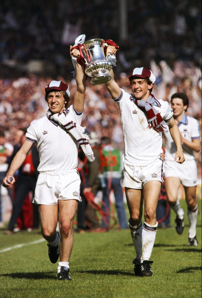  West Ham United players Geoff Pike (left) and Paul Allen parade the trophy after beating Arsenal 1-0 in the 1980 FA Cup Final