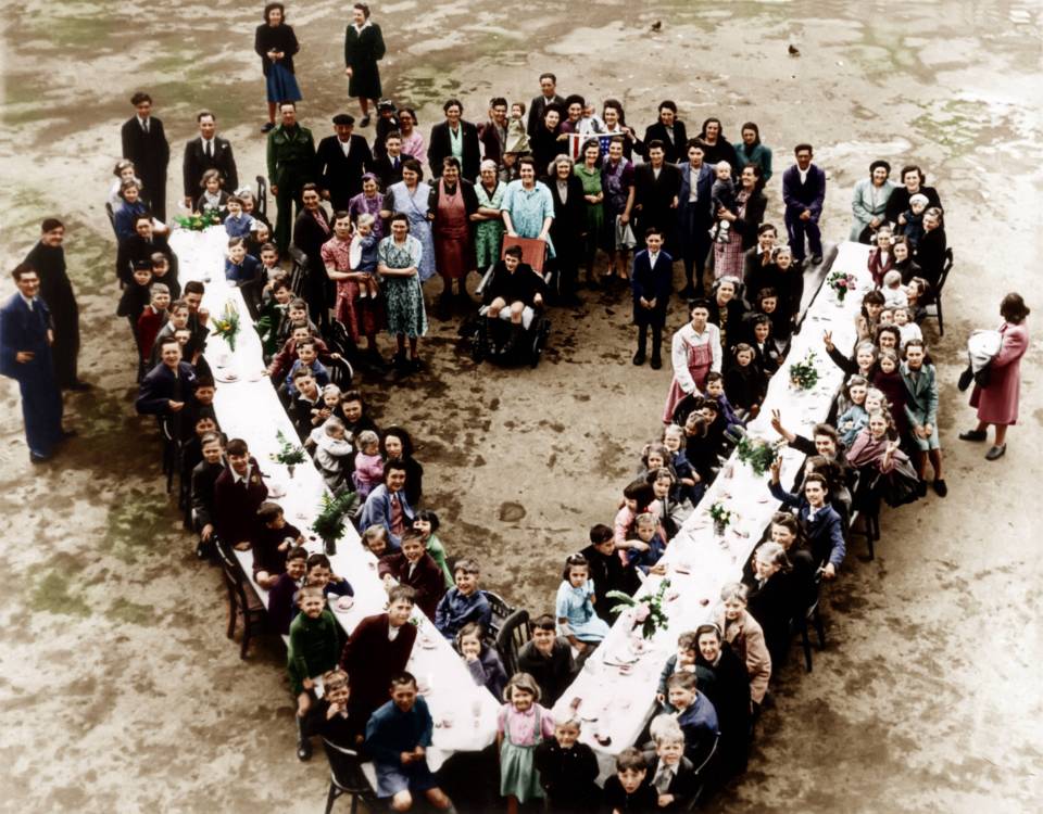  Camberwell school children celebrate with a tea party at a V-shaped table