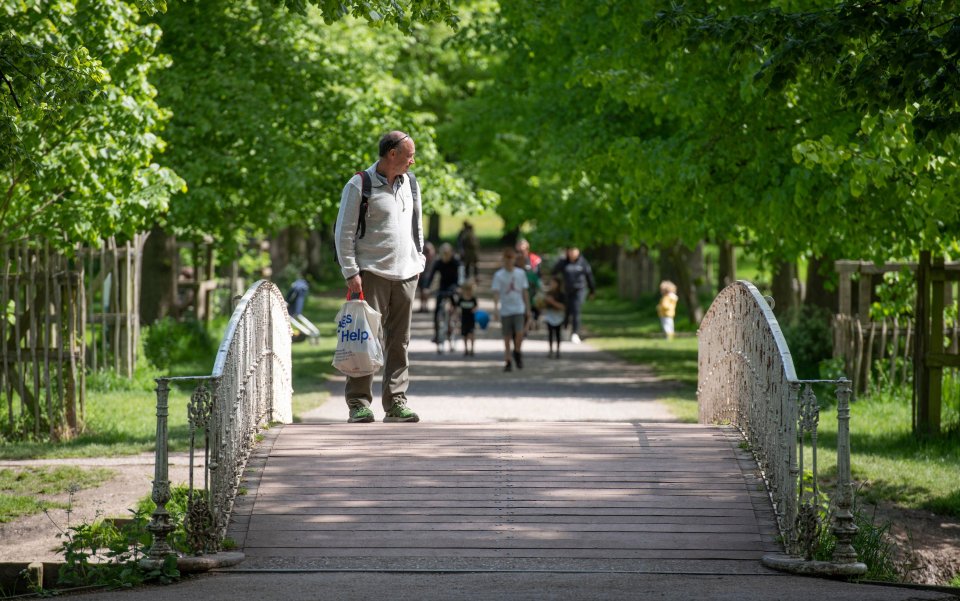  Brits enjoy the sunshine while maintaining social distancing rules in London