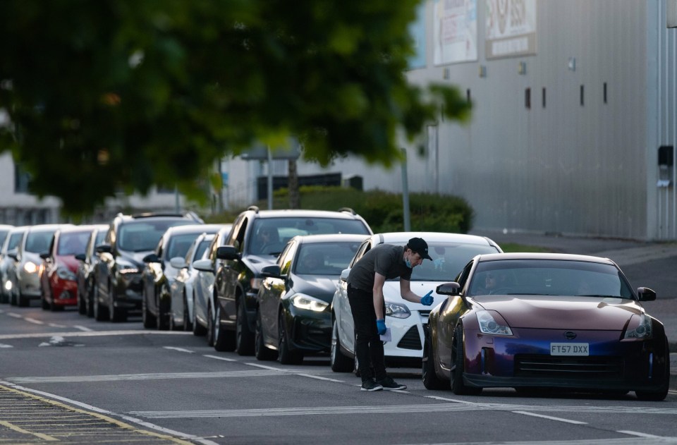 KFC workers were delivering orders to those waiting in the queues in Basingstoke, Hants.