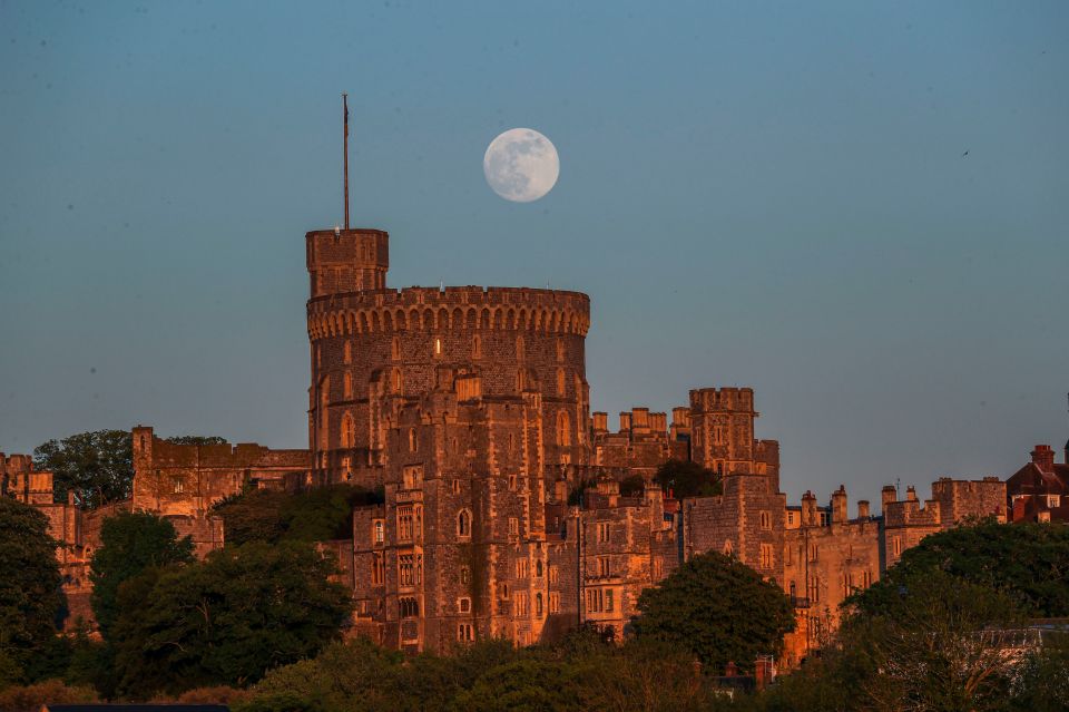  The Moon rises over Windsor Castle in Berkshire