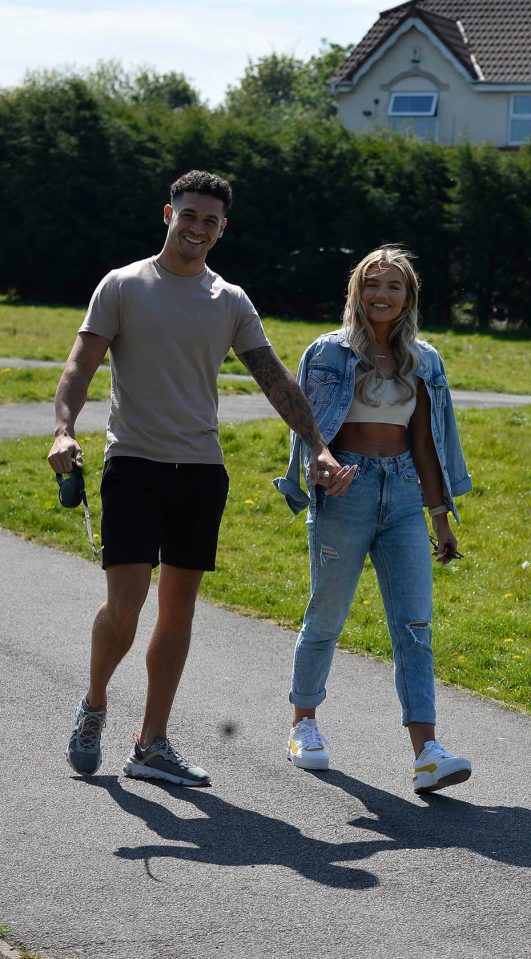  Love Island couple Callum Jones and Molly Smith smiled as they held hands in the sunshine