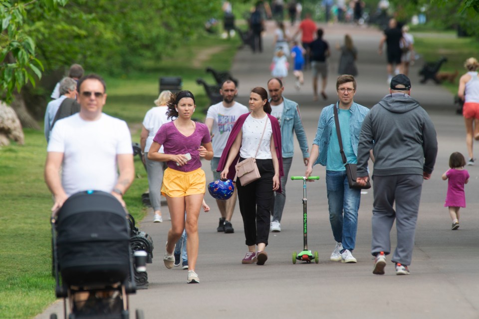  Londoners exercising in Battersea Park in the hot weather today