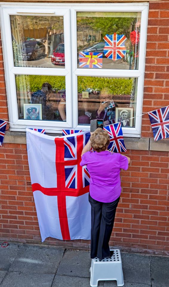  Heartwarming scenes came as well-wishers gathered outside the Oldham care home