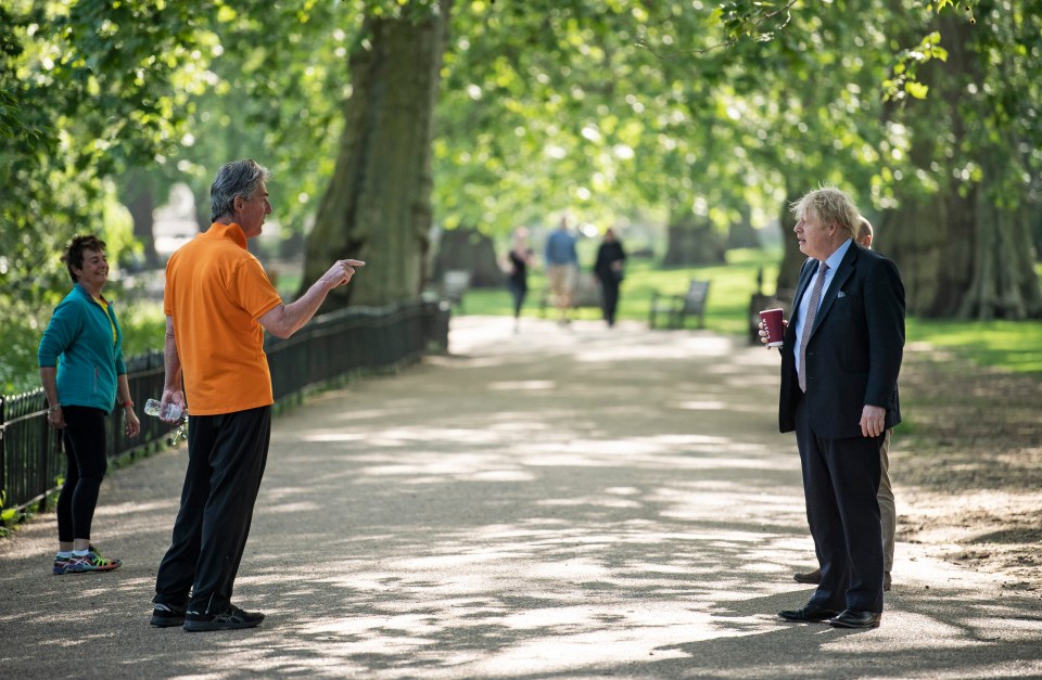  Boris is easing his approach to keeping the UK in lockdown but is recommending social distancing as he demonstrated during his walk this morning