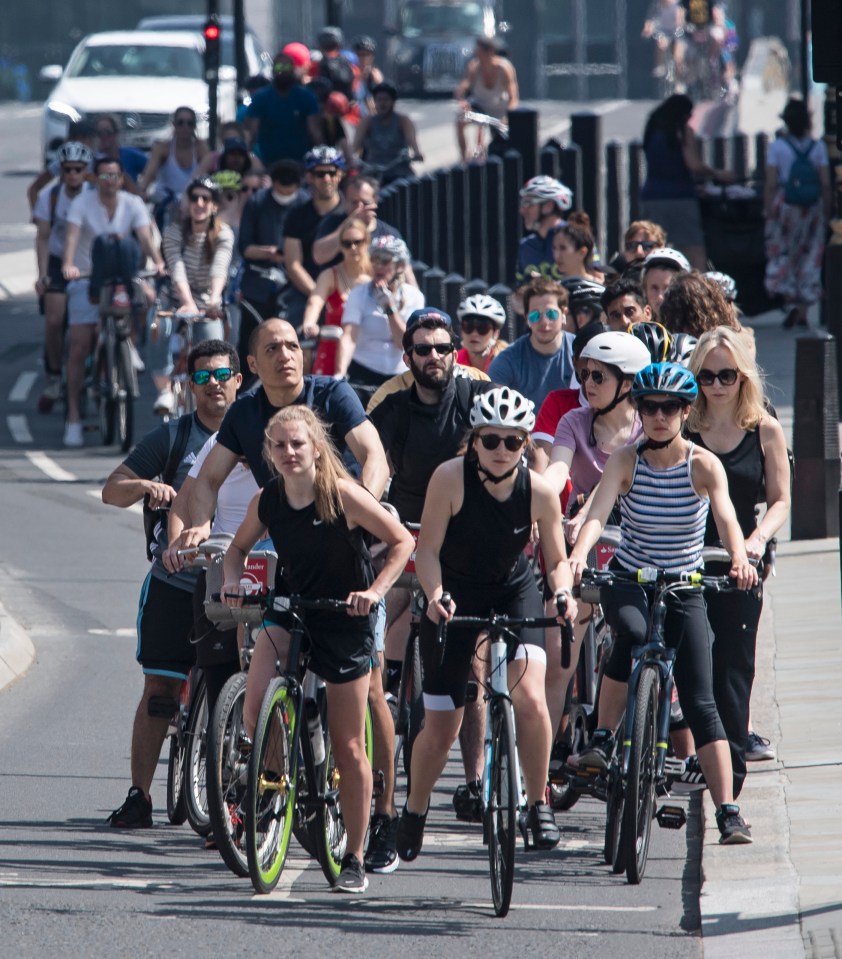  Dozens of cyclists are seen in Westminster despite the plea to stay at home