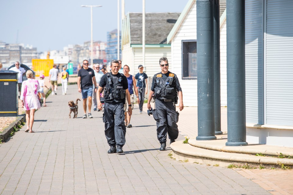  Police offers patrol the beach and Promenade in Brighton and Hove during the May Bank Holiday