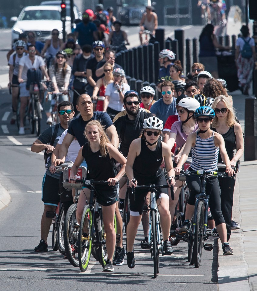  In London, cyclists took to the streets as temperatures soared in the capital