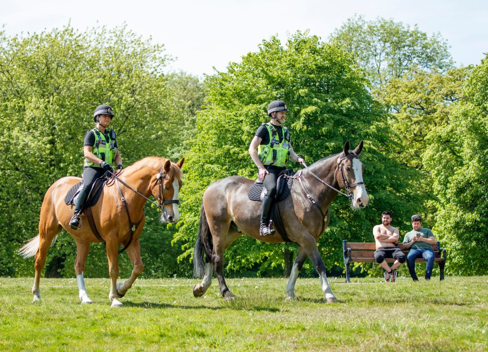 Police patrolling Heaton Park in Manchester earlier today