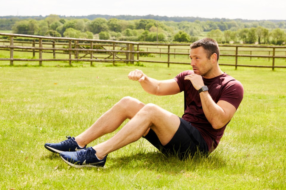  Lie on your back with legs bent. Lift your upper body off the floor into a sit-up then punch left and right, hand forward, at the top