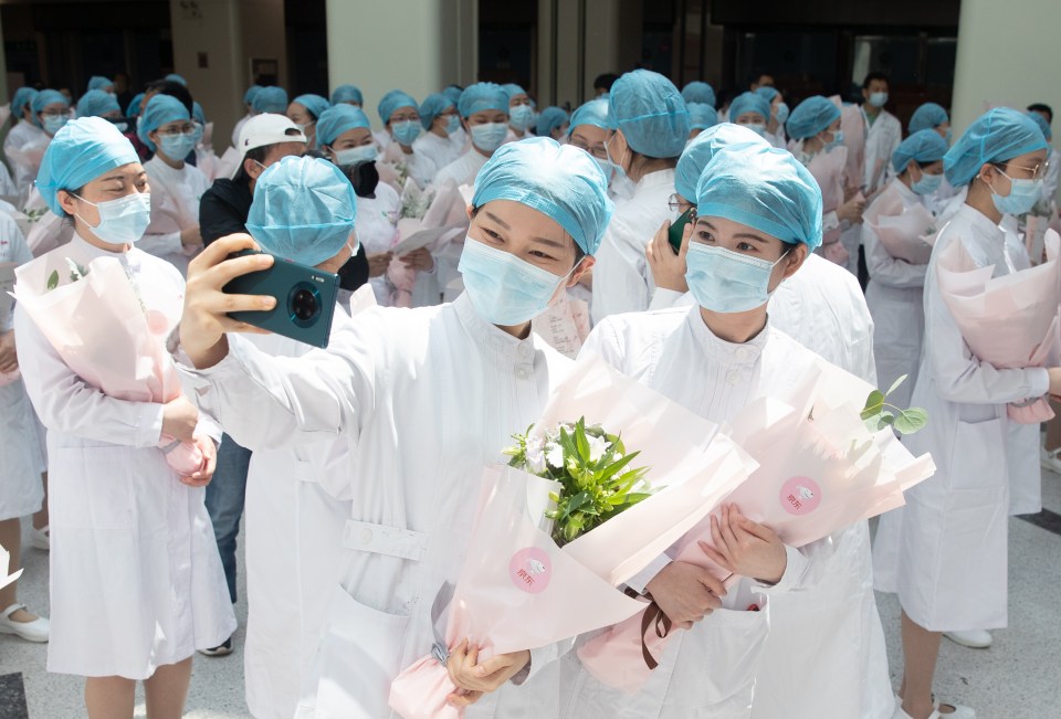  Chinese nurses take a selfie on International Nurses Day at Tongji Hospital in Wuhan, Hubei province, China, May 12