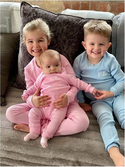  Sophie, six, and Finlay, three, with the latest member of the family Olivia