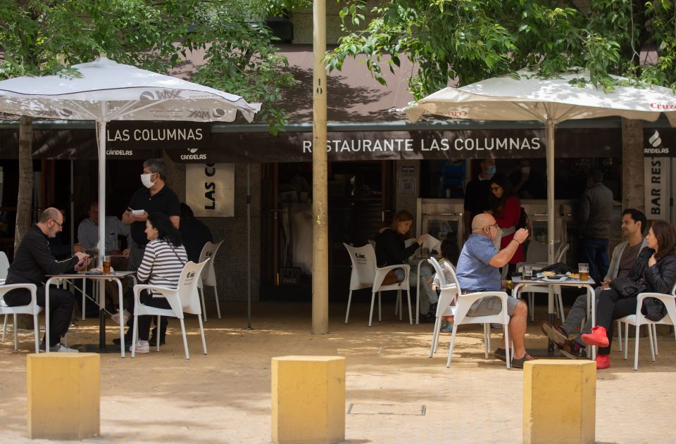  People on the terrace of an open bar in Madrid on May 12