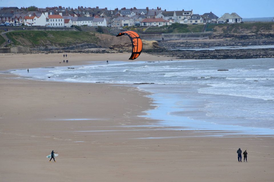 A kite surfer makes the most of the lockdown relaxation by enjoying unlimited exercise on Tynemouth beach today (WED) in North Tyneside