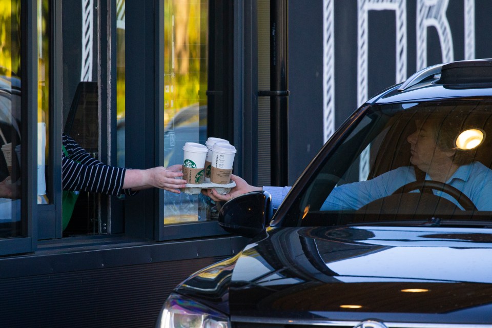 Drivers in Portsmouth collect their coffees from Starbucks today