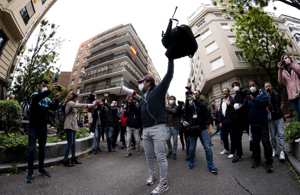  A man shouts with a megaphone during a protest by residents yesterday in Madrid