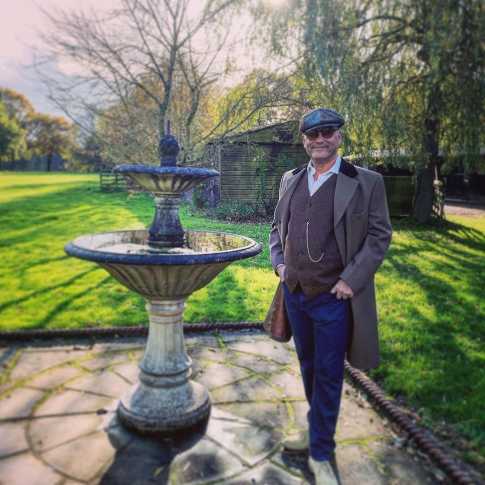  Looking like a proper English gent, Gregg shows off his spectacular water piece