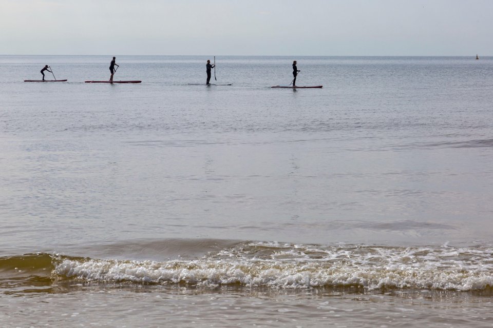  A group went paddleboarding in Bournemouth as they enjoyed the warm weather and the easing of lockdown