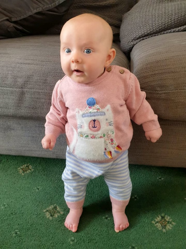 Baby Lula has been dubbed the 'world's strongest baby' as she could stand at eight-weeks-old and held up her head at five days