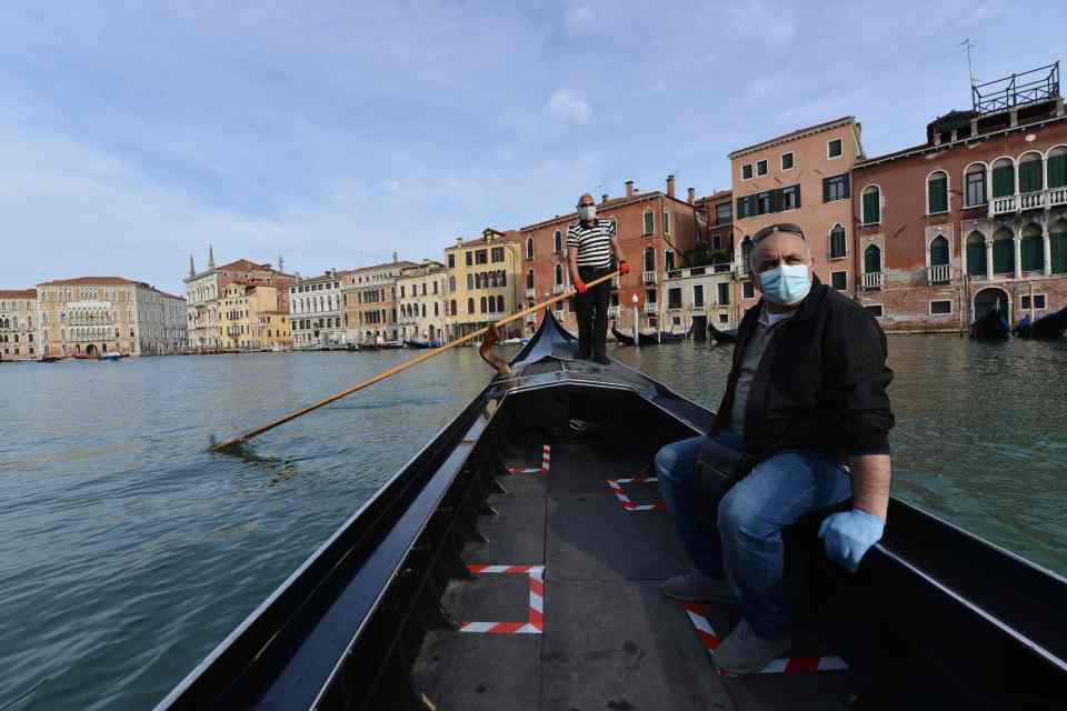 Gondolas were allowed back on the canals in Venice, with spaces marked to keep passengers apart