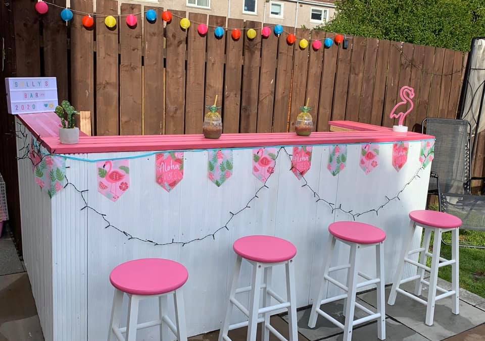 She painted it pink and white - and even did the stools to match