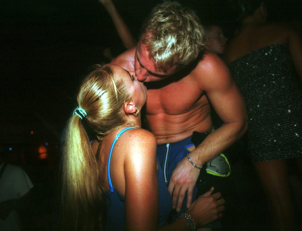  Clubbers smooch on the dancefloor in 2001