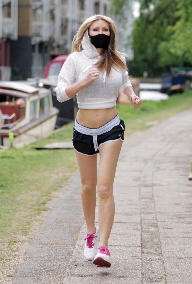 Caprice wore a face mask while out for a run