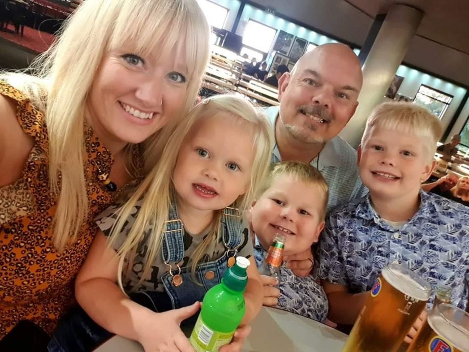 Emma, 37 and husband Paul, 51, pictured with their three children, Marley, 10, Maxwell, 8, and Maisie, 4.